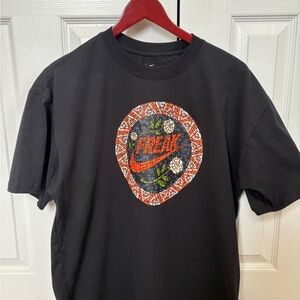 Nike Black Tee with Orange and White Greek Freak Graphic